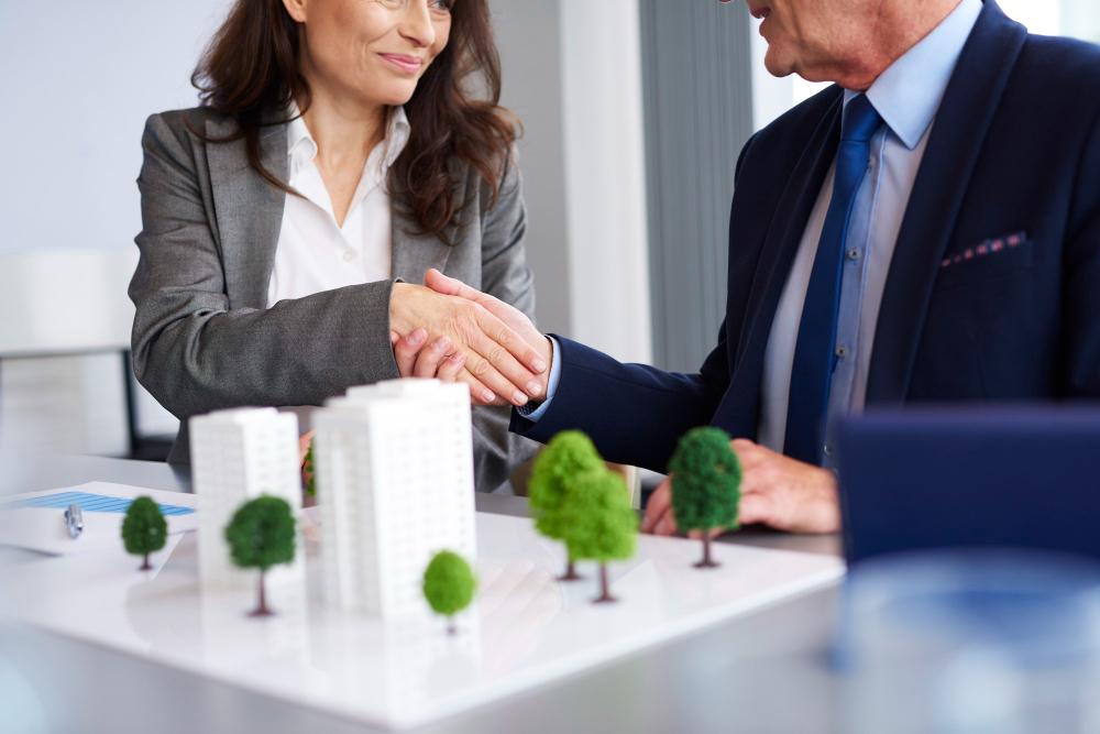 Business professionals shaking hands during a successful deal 